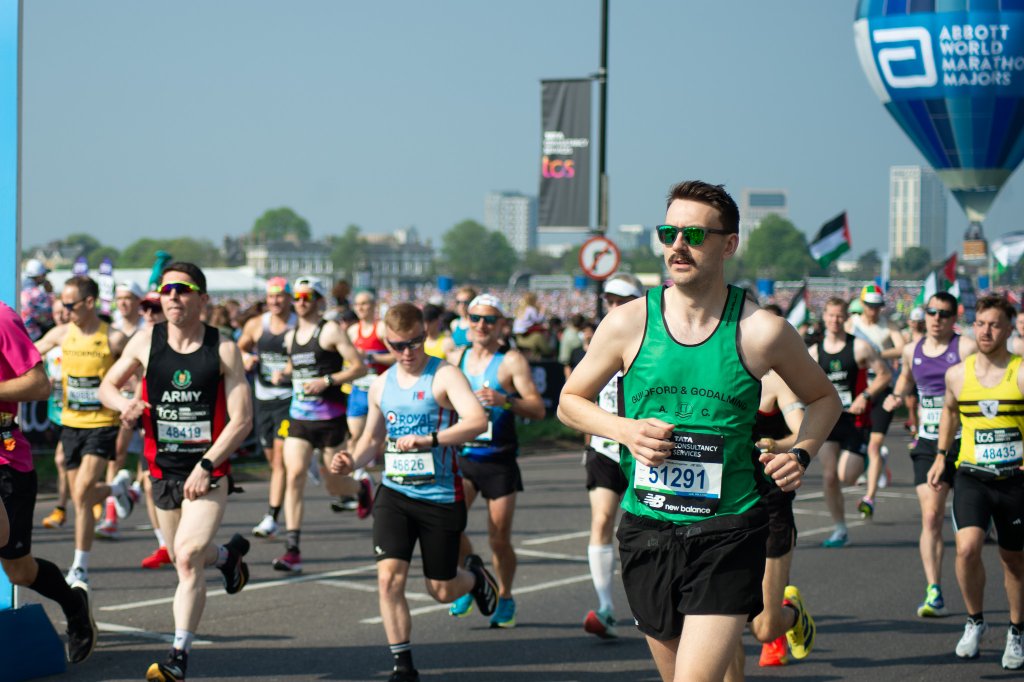 James Whizz Kidz runner smiling in Greenwich Park
