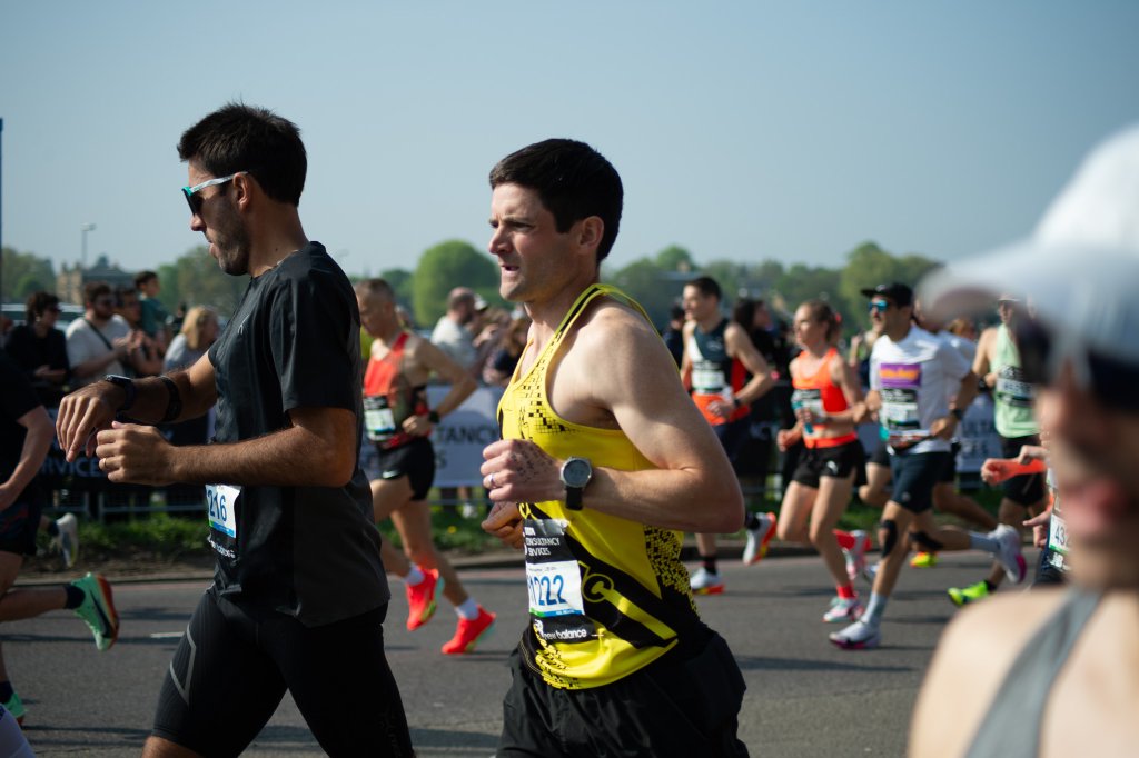Runners in matching blue shirts