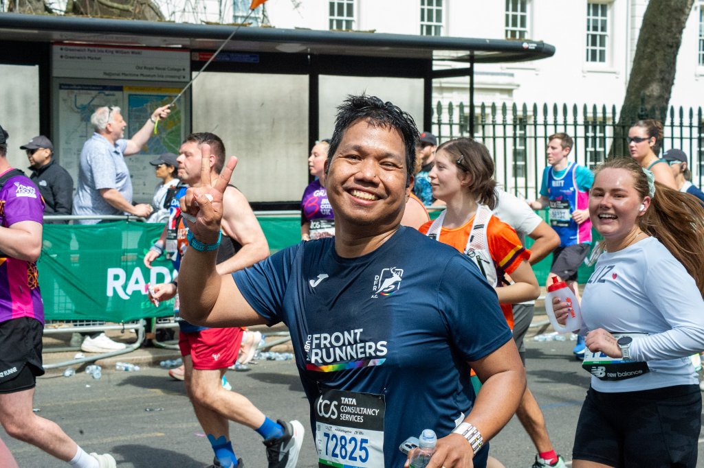 Runners in colourful costumes