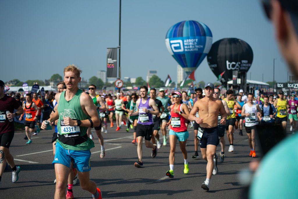 James MS Trust runner reaching for a high-five