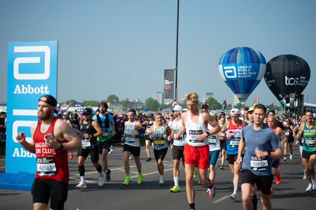 Runners heading toward Greenwich Park wall